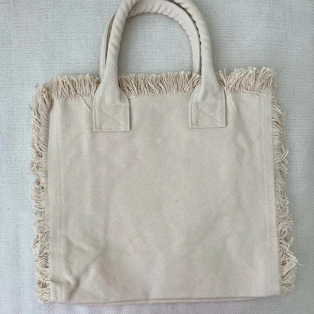 Fringed Canvas Tote Bag
16”w x 15”h x 8”d - Picture 3 of 4